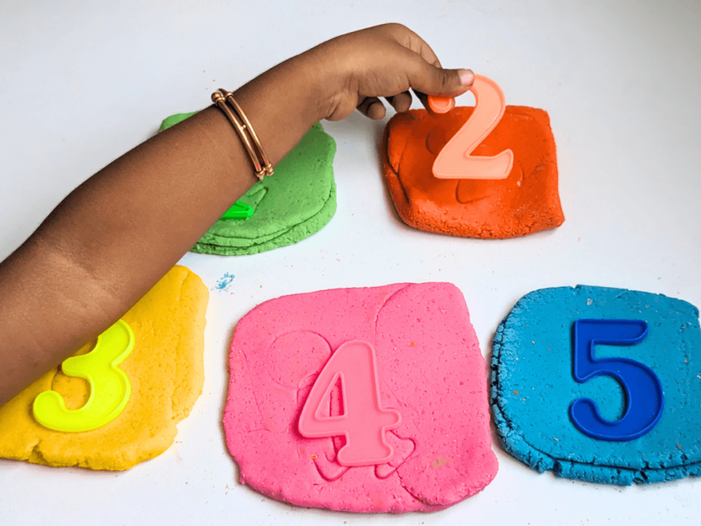 Number stamp on Play dough 