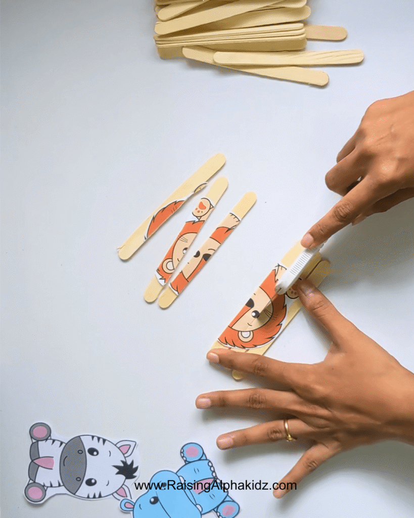 Step 5: cut the popsicle stick puzzle pieces