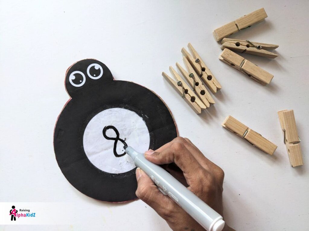 write numbers on the spider using write and wipe pen