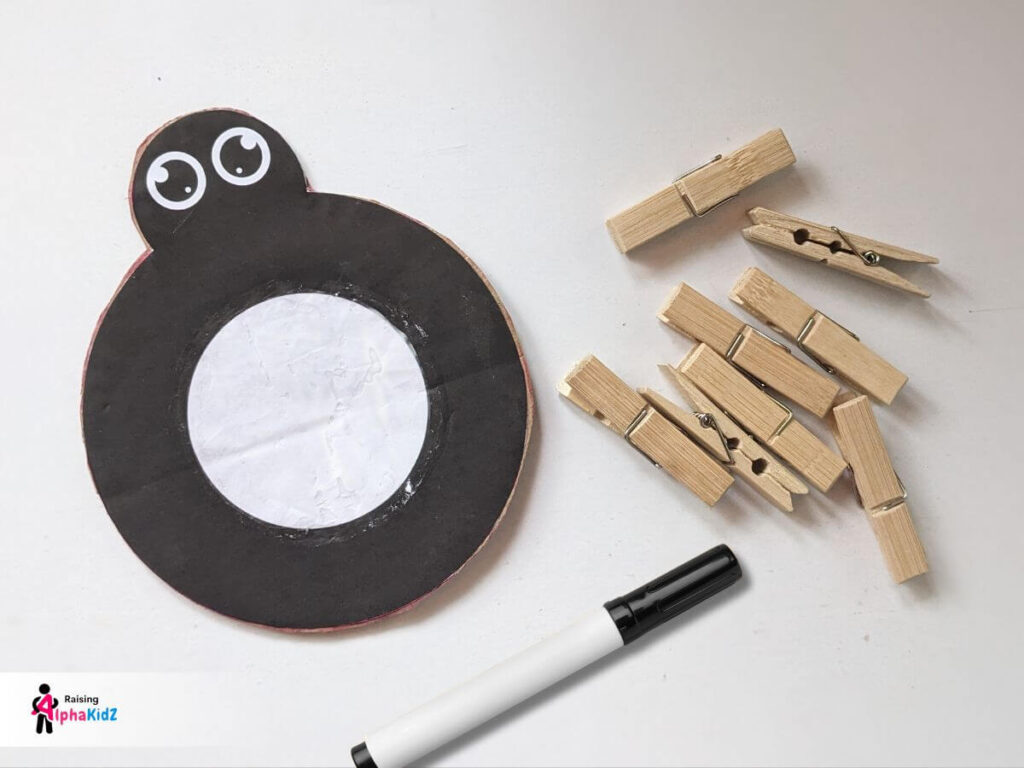 paste the spider cutout on cardboard