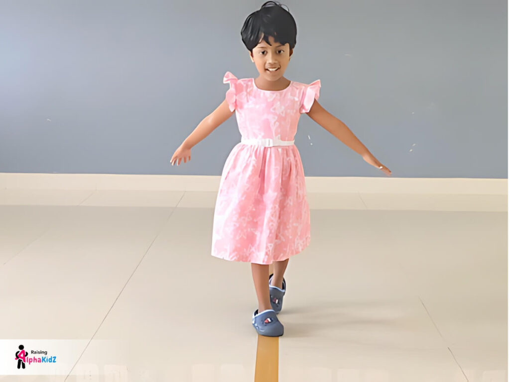 Kid walking on balancing beam