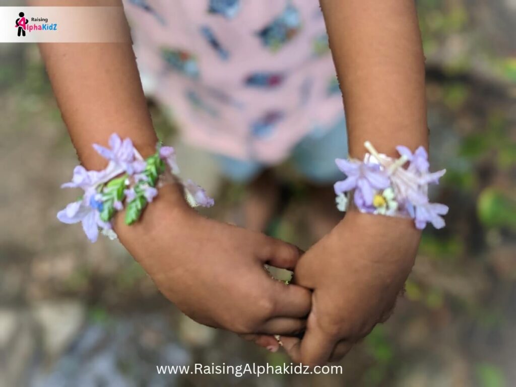 DIY flower jewelry craft for children using tape and natural materials