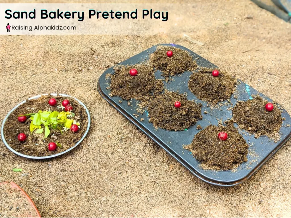 sand cupcakes made in tray during pretend sand play activity