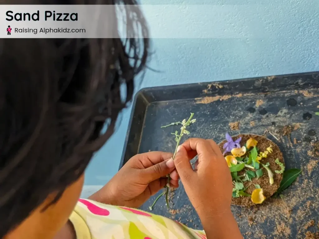 kid decorating pretend sand play pizza