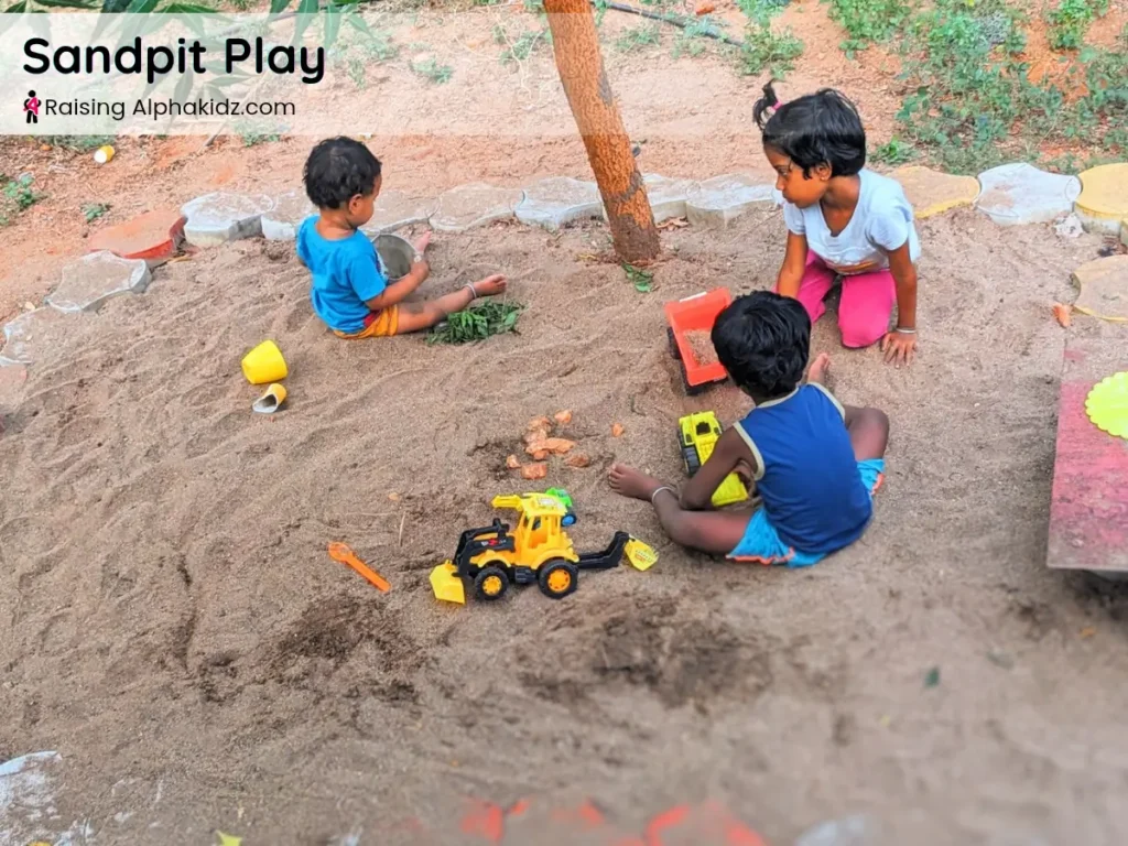 children playing in sand during sensory 5-4-3-2-1 grounding play