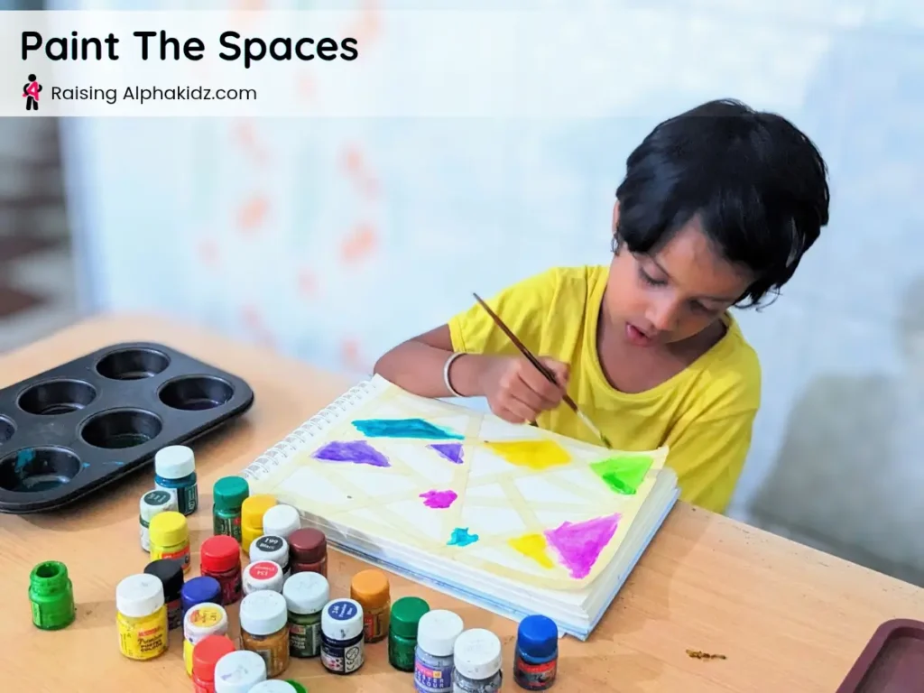 painting over taped surface for colorful tape resist art