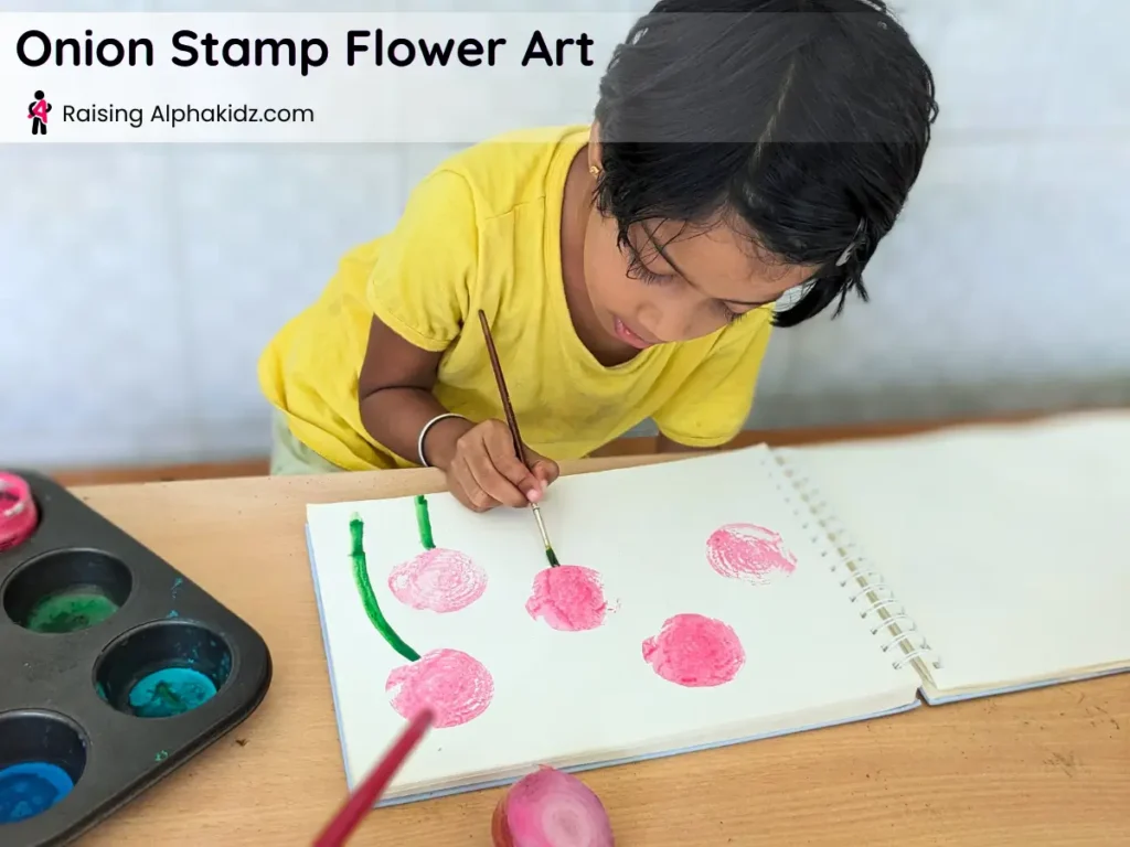 onion stamp art flowers with green stems painted after onion printing activity