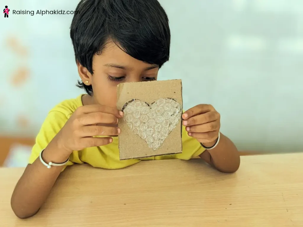 A heart shaped bubble wrap pasted on cardboard stamp