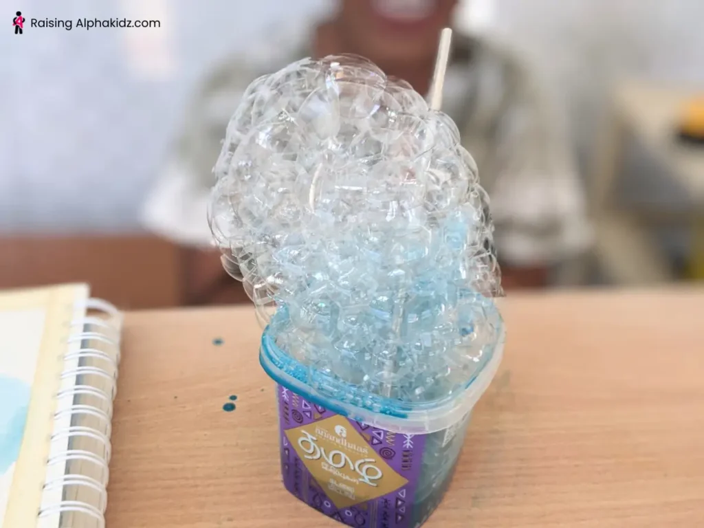 The overflowing soap bubbles made to create soap bubble art