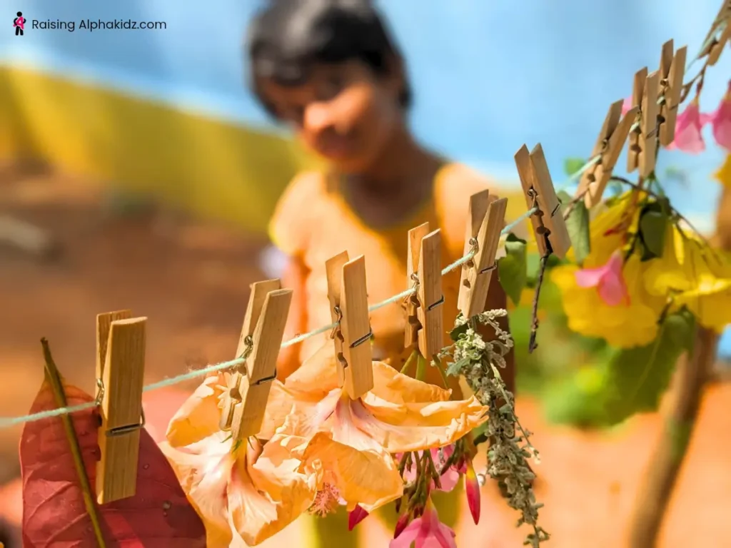 Nature garland made out of different leaves and colorful flowers 