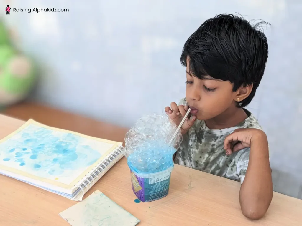 Making overflowing bubbles to make soap bubble artl
